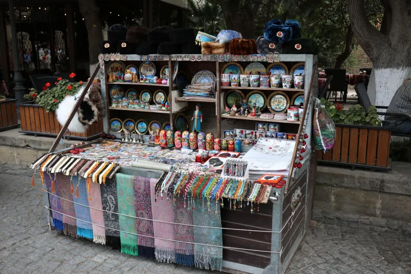 That Snow Globe Won't Save the Memory: The Truth About What We Buy When We Travel